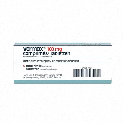 Boîte de Vermox et logo pharmacie en ligne